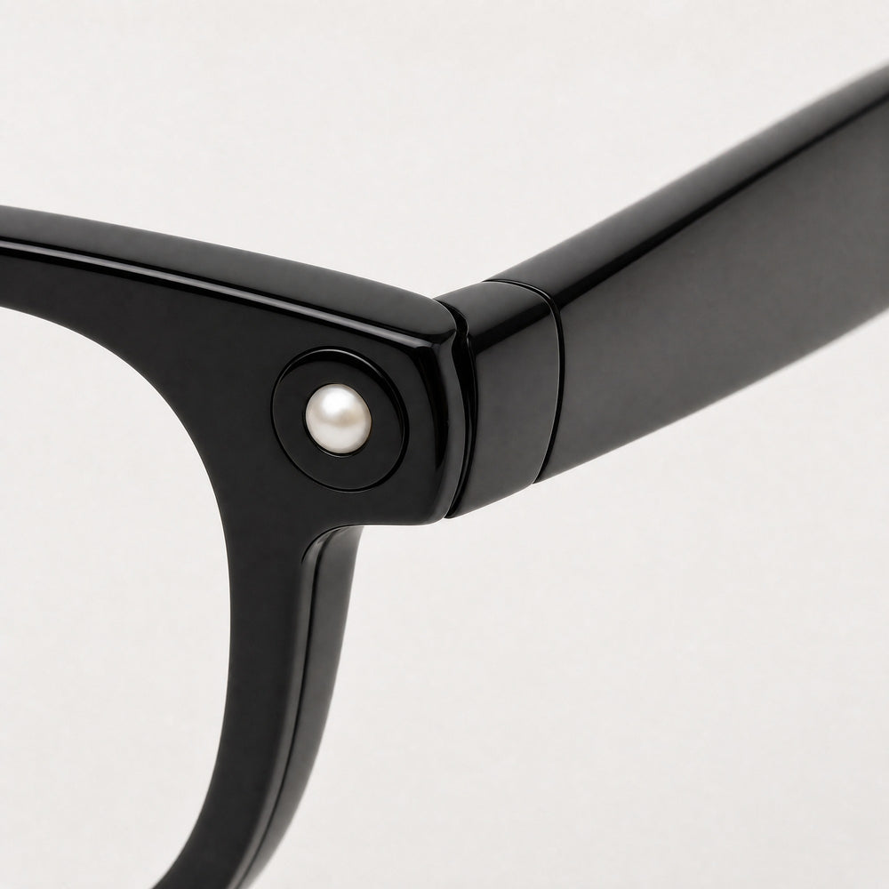 Michel eyewear, close-up of the frame, temple, and hinge construction