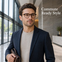 Man wearing round tortoiseshell optical frames while commuting