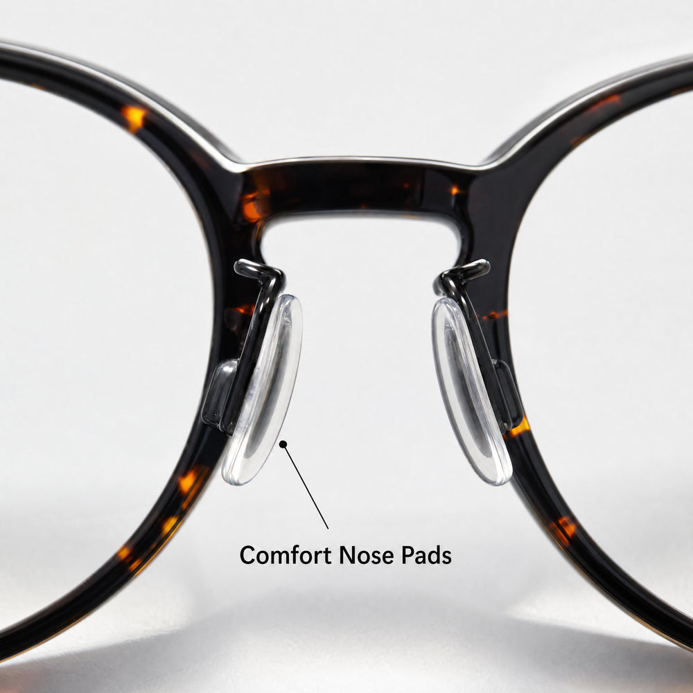 Adjustable clear nose pads on tortoiseshell optical frames