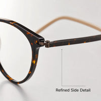 Hinge and slim temple detail on tortoiseshell eyeglasses