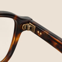 Dominique eyewear, close-up of the frame, temple, and hinge construction